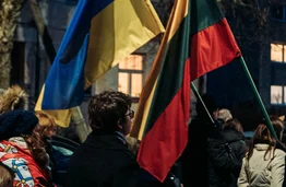 People Carrying Flags while Marching for Peace // Artūras Kokorevas, Pexels
