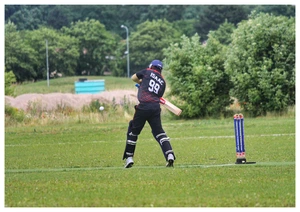 Isaac playing cricket